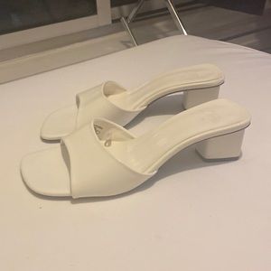 White heeled mules